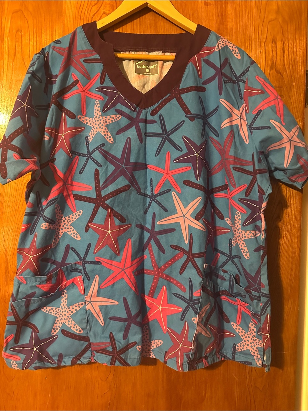 Women’s scrub top multi colored with starfish